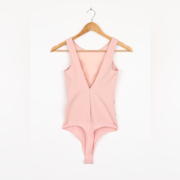 Lulu’s pink bodysuit - Picture 3 of 5